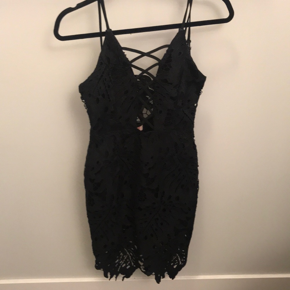 Sexy little black dress with cutouts